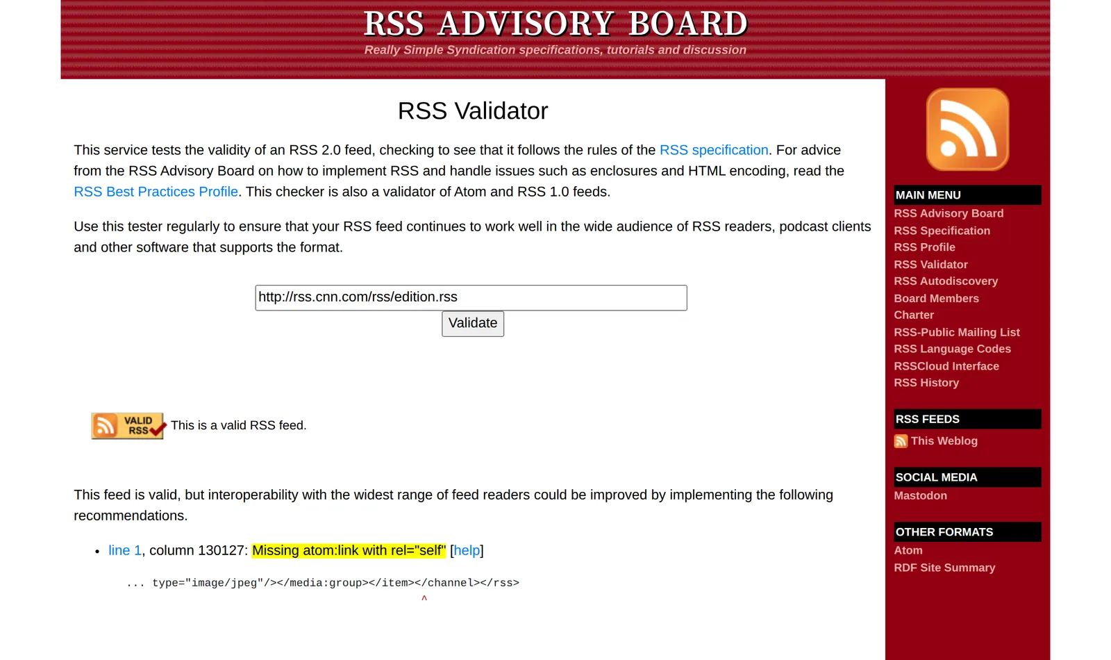 The RSS Advisory Board validator result for rss.cnn.com/rss/edition.rss saying "This is a valid RSS feed", with only a missing atom:link recommendation